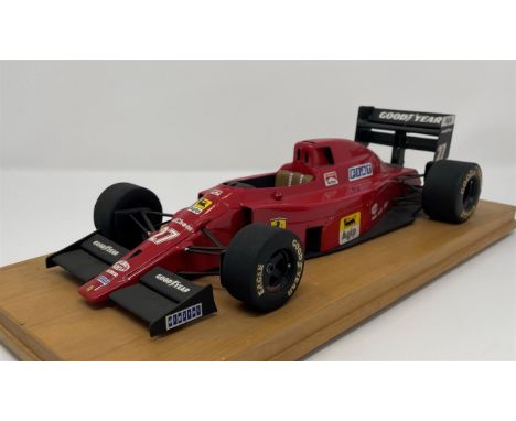 Well-detailed model of Nigel Mansell's Tipo 641 on a wooden plinth.Designed by John Barnard, the 1990 641 was the first Formu