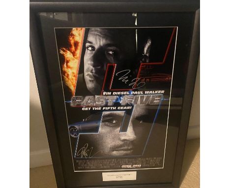 A photo print depicting a cinematic poster for the Fast &amp; Furious – Fast Five. Hand-signed in silver marker ink by Paul W
