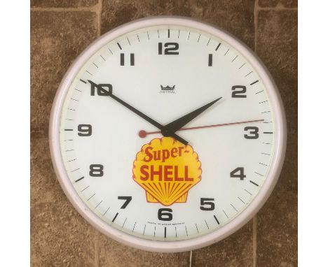 Having a white 12" dial (30cm) and bearing 'Super Shell' motif apon.Arabic numerals, sweep seconds hand, all before the elect
