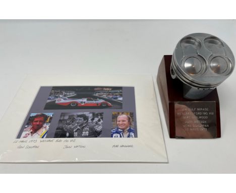 Plinth-mounted used piston from a Weslake-Ford V12 fitted to a 1973 Gulf Mirage M6.Piston from a 1973 Le Mans-prepared Gulf M