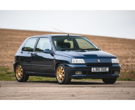 Blue Silver Renault Clio 2 0 16V Viewed Against Dramatic Sky Stock