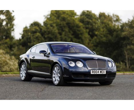 Virtually flawless, dramatically presented in Dark Sapphire with Saffron hide, less than 7,000 miles from new and 16 Bentley 