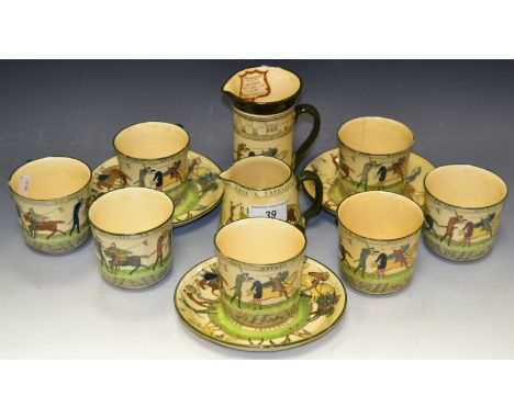 A  Royal Doulton Bayeaux Tapestry tea service, comprising seven cups, two jugs, three saucers, printed marks, D2873