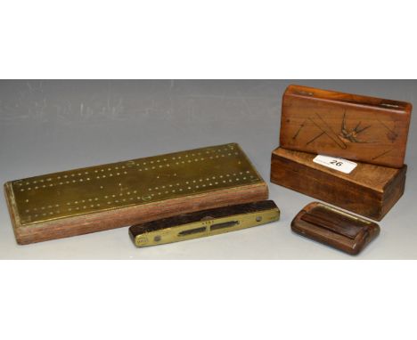 An Empire brass mounted rosewood spirit level; a brass mounted cribbage board; snuff box; etc (5)