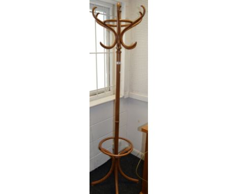 A light bentwood coat and  hat stand