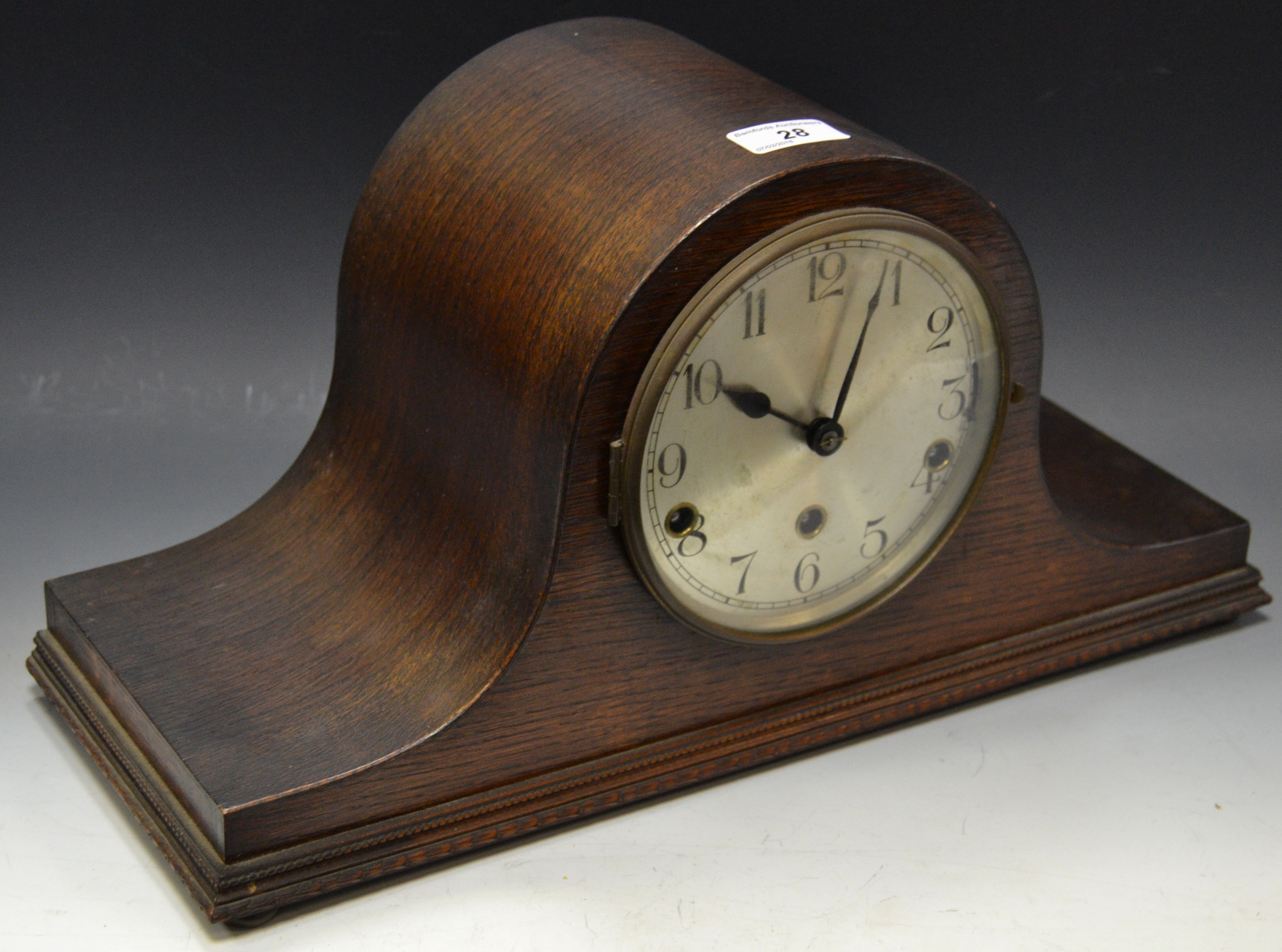 An early 20th Century Napoleon hat mantel clock, trio winding holes c. 1940