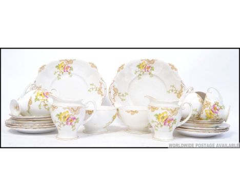 A fabulous chintz pattern ' Empress ' Royal Standard tea service comprising cups, saucers, creamer, bowl, sandwich plate etc