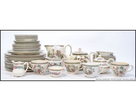 An Indian tree pattern dinner and tea service. Comprising cups, saucers, plates, teapot etc. Makers Johnson Bros, Maddock and