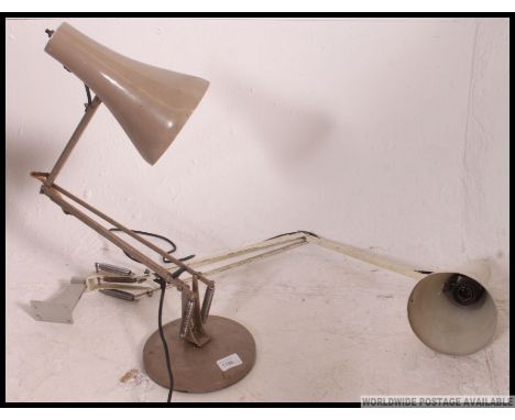 A post war beige anglepoise desk lamp by Herbert Terry having circular base and pendant shade. Together with a white wall mou