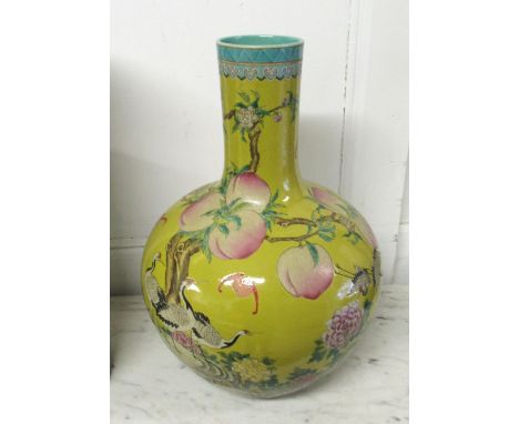 LARGE CHINESE BOTTLE VASE, 21st century famille jaune ceramic decorated storks amidst blossoms, 54cm H.