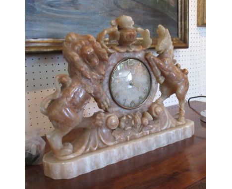 MANTEL CLOCK, onyx depicting carved heraldic lion and unicorns, 42cm x 35cm H.