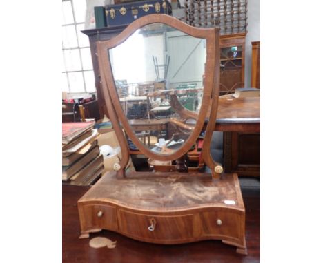 A GEORGE III DRESSING MIRROR WITH SHIELD SHAPED PLATE AND THREE DRAWERS 