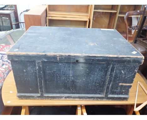 A LARGE 19TH CENTURY PINE TRUNK with original black paint98 x 67cm