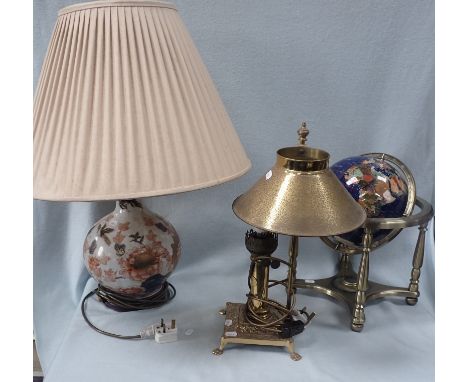 AN ORIENTAL STYLE CERAMIC LAMP AND GLOBE IN BRASS STAND including a oriental styled ceramic lamp with wooden base, a converte