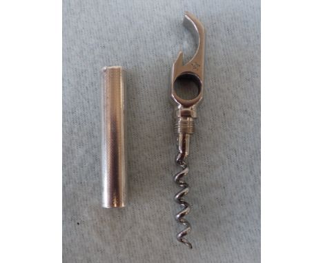 CORKSCREW AND BOTTLE OPENER WITH ENGINE TURNED SILVER HANDLE 'stamped sterling' (corkscrew bent)