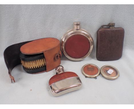 A LEATHER-COVERED HIP FLASK others similar, silver-plated photo frames and cased dressing brushes