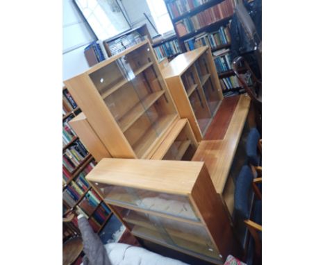 A MID 20TH CENTURY 'SIMPLEX' LIGHT MAHOGANY SECTIONAL BOOKCASE with sliding glass doors 92 cm wide, and a collection of simil