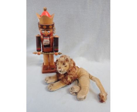 A STIEFF LION (WITH BUTTON) and a German nutcracker