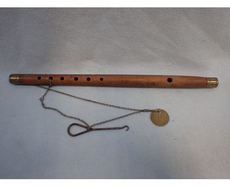 A BRASS-MOUNTED WOODEN RECORDER 37.5cm long, with attached pit token; 'Brayton No. 5 pit, 41', and a button hook