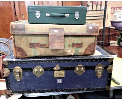 A VINTAGE TRAVELLING SUITCASE AND OTHER SIMLIAR ITEMS with a trunk and a picnic case with missing pieces 