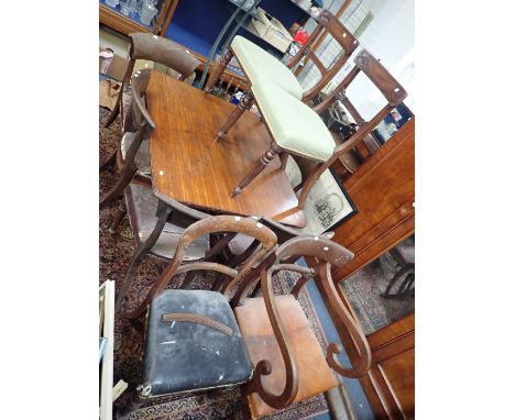 A 19TH CENTURY BREAKFAST TABLE  112cm wide, a group of dining chairs (11,all in need of repair), a large oak fire curb, anoth