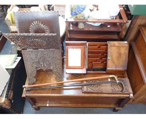 A CARVED KORAN STAND, A CARVED BOOK RACK together with a small coffer, two walking sticks (one with secret flask)and a Victor