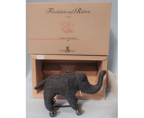 A STEIFF 12CM FELT ELEPHANT ON WHEELS boxed, with certificate, Steiff Club Edition 2004, no. 00604