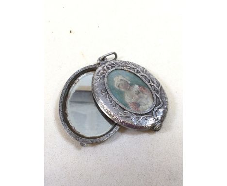 Antique French silver slide locket pendant mirror with hand painted enamel portrait. Engraved â€˜Argentâ€™ to clasp, with mon