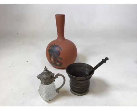 A glass whisky noggin with white metal lid, a brass mortar and pestle and a terracotta bootleg vase H:15cm Noggin 