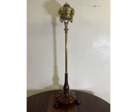 A Victorian mahogany tripod base with brass column oil lamp. H:120cm