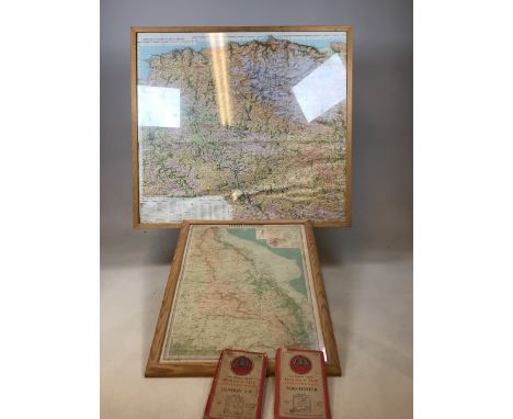 Maps. A framed and glazed Ordnance survey map of North Devon, a framed Times map of Eastern Queensland and 2 vintage Ordnance