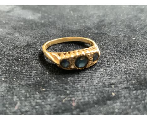 9ct gold ring set with sapphires and illusion mounted diamonds. Size M. Total weight 3gm 