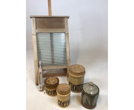 A vintage wash board with thermometer, TG Green storage canisters and one other 