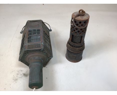 A military lantern marked with war department logo 52. Made by G Pollkey C&M 1895 Birmingham. Later converted to electricity.