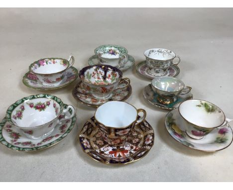 Cabinet cups to include Royal Crown Derby, Royal Worcester, Royal Doulton and others 