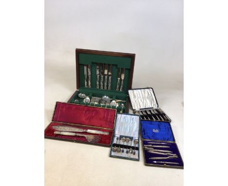 A part canteen of cutlery - EPNS Sheffield with three other boxed items - fish servers with mother of pearl candles, plated b