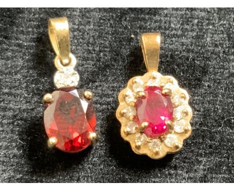 9ct gold ruby and and diamond pendant also with a garnet and diamond pendant with rubbed hall mark 