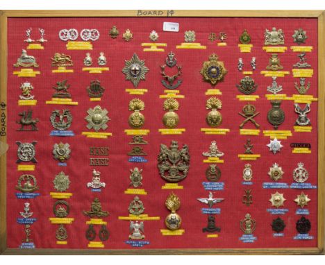 COLLECTION OF BRITISH MILITARY CAP BADGES AND SHOULDER TITLESmostly brass examples, from regiments including Royal Signals, T