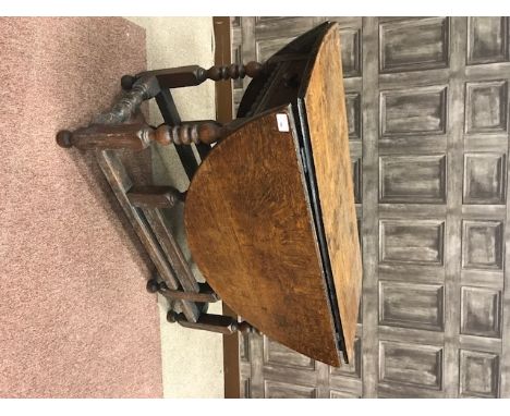 QUEEN ANNE OAK OVAL GATE LEG OVAL TEA TABLEwith two frieze drawers, on bobbin turned legs and stretchers, 104cm wide