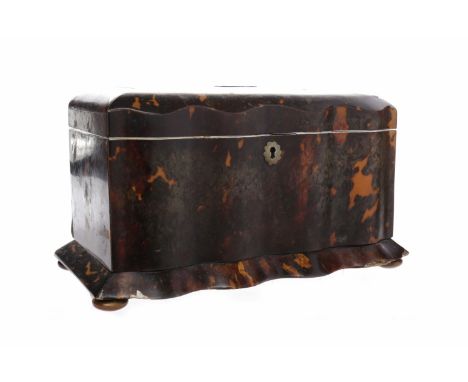 VICTORIAN TORTOISESHELL VENEERED TEA CADDY with cavetto front, the interior lined with red velvet and two covers, approximate