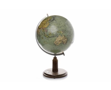 20TH CENTURY TERRESTRIAL GLOBE on a stepped mahogany stand and circular base, inset with compass, 53cm high