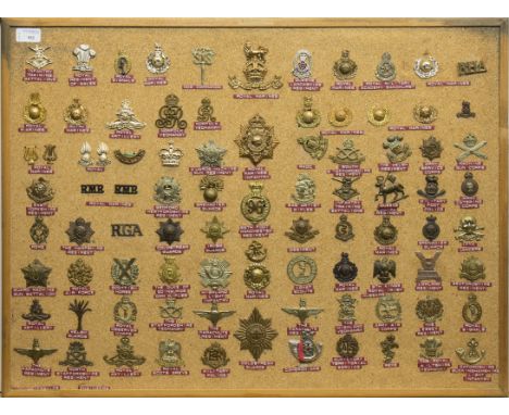 COLLECTION OF BRITISH CAP BADGES AND SHOULDER TITLESmostly brass examples, from regiments including the Infantry Training Bat