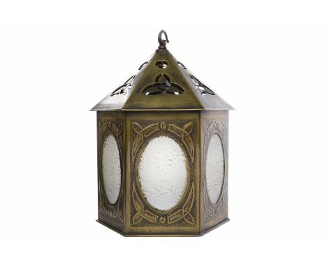 ARTS AND CRAFTS BRASS LAMP IN THE GLASGOW STYLEunsigned, hexagonal, six-sided shape with peaked roof, the sides with oval fro