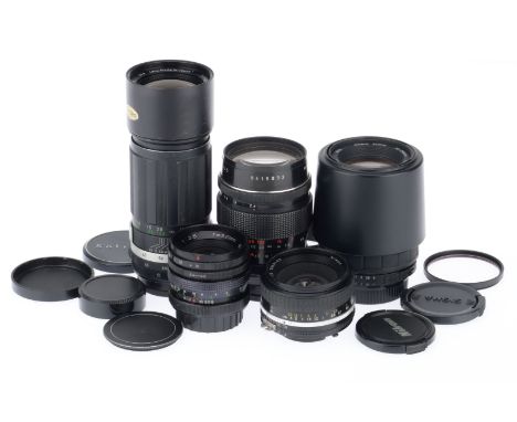 A Selection of 35mm Camera Lenses, to include a Nikkor f/1.8 50mm prime, barrel G, optics F with fungus threads, a Pentacon f