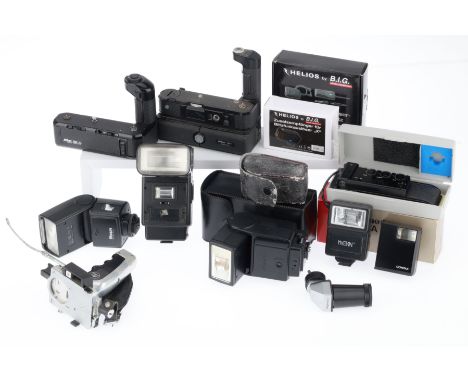 A Selection of Photographica, to include a Minolta power winder, a Nikon battery grip/winder, a Canon Data Back A, a Minolta 