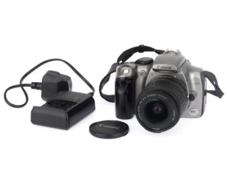 A Canon EOS 300D Digital SLR Camera, silver, body F-G, some light surface marks, powers up, autofocusses, takes a picture, wi