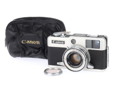 A Canon Demi Rapid Camera, silver, serial number 125293, body G, focus works, viewfinder display is clear, shutter not workin