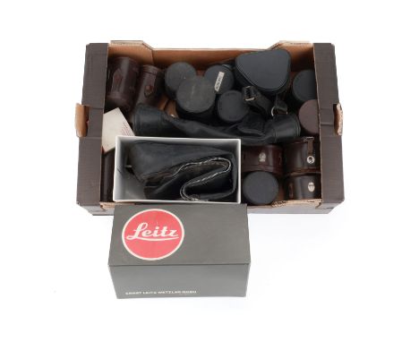 A Selection of Leica Lens Cases, various sizes, black soft cases, brown rigid cases and two leather sheath cases.