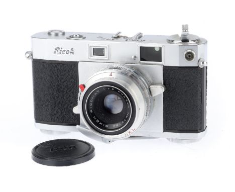 A Ricoh 500 Rangefinder Camera, silver, body G, shutter works, rangefinder works, optics F with some haze.