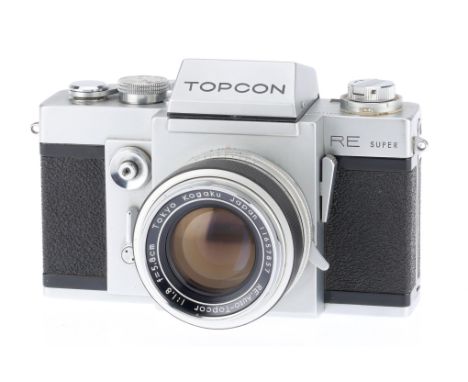 A Topcon RE Super 35mm SLR Camera, silver, body VG, serial 4641105, shutter works at all speeds, metering not tested, with Ko